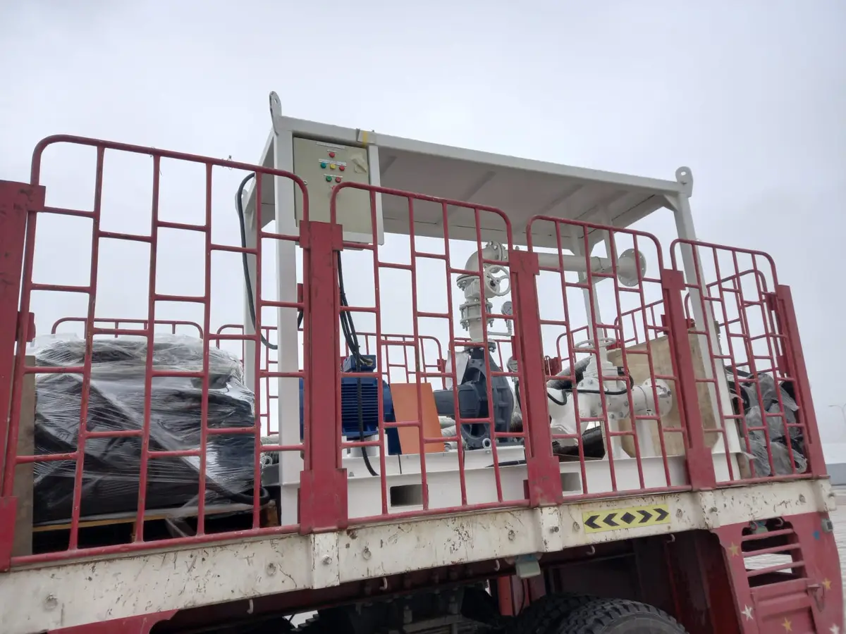 Pump skid and equipment loaded on a truck for delivery to site